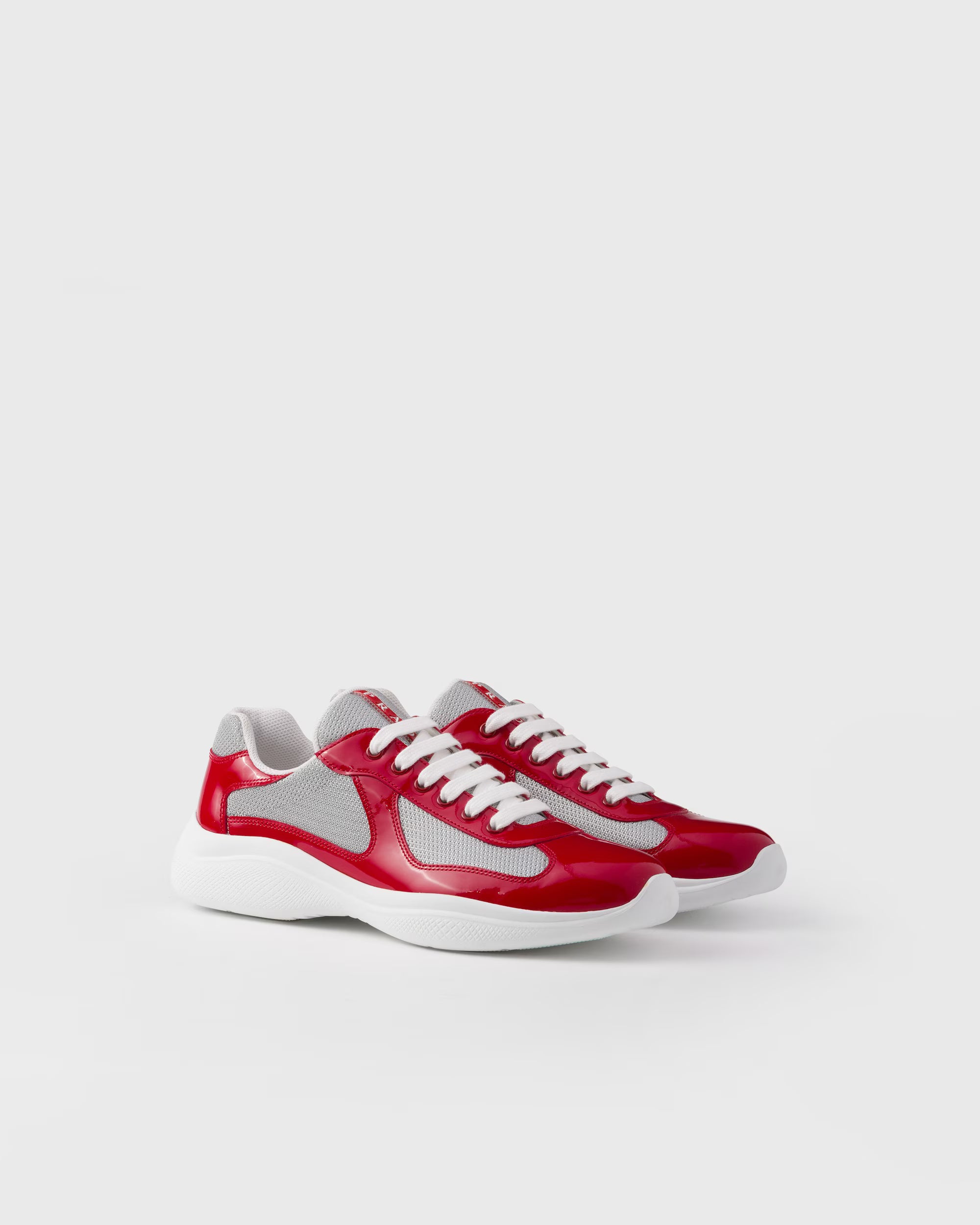 Sneakers Prada America’s Cup en cuir verni et tissu technique ROUGE