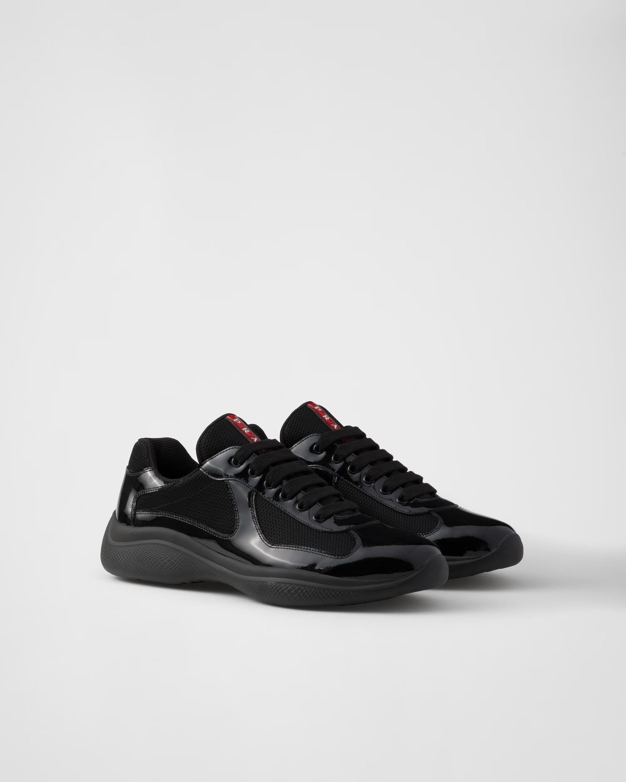 Sneakers Prada America’s Cup en cuir verni et tissu technique NOIR